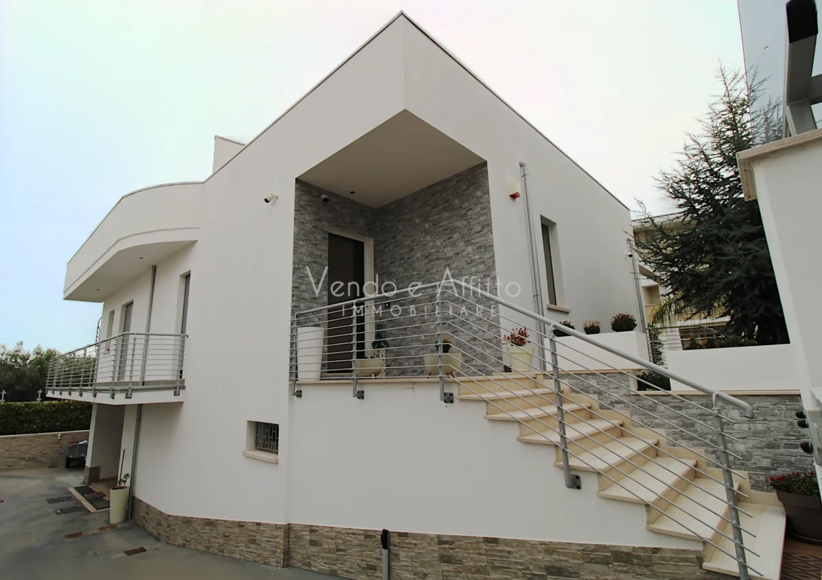 Villa con giardino